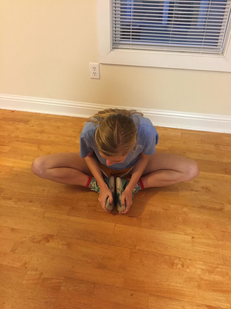 This stretches your inner thighs.