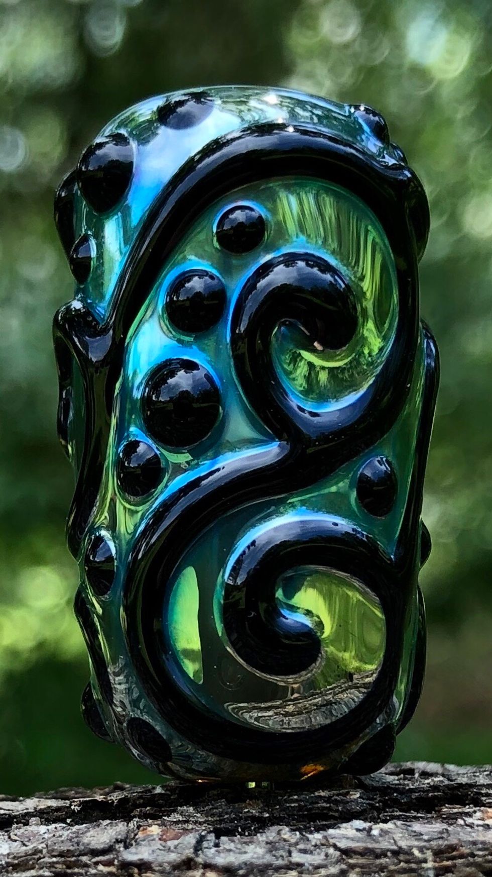 This technique works great with Melia 2, Arke, Iris, and Iaso. You can also try reversing the pattern, with black scrollwork over a silver luster.