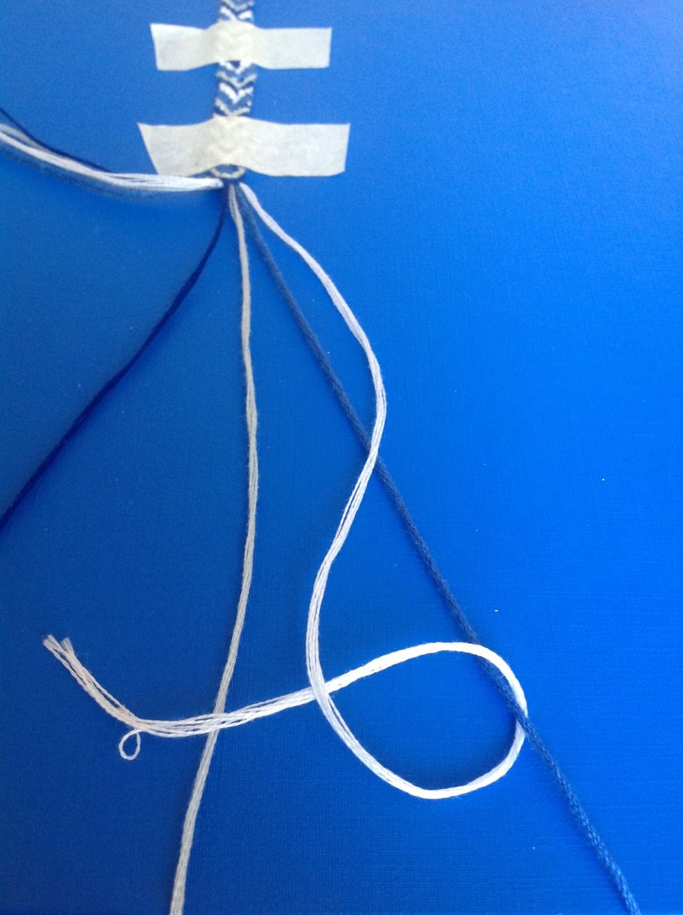 This time do backward knots along all 4 strands.