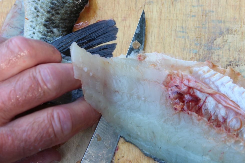 This time, you can try to remove the fillet completely from the skin before cutting out the small body cavity - see which method works best for you.