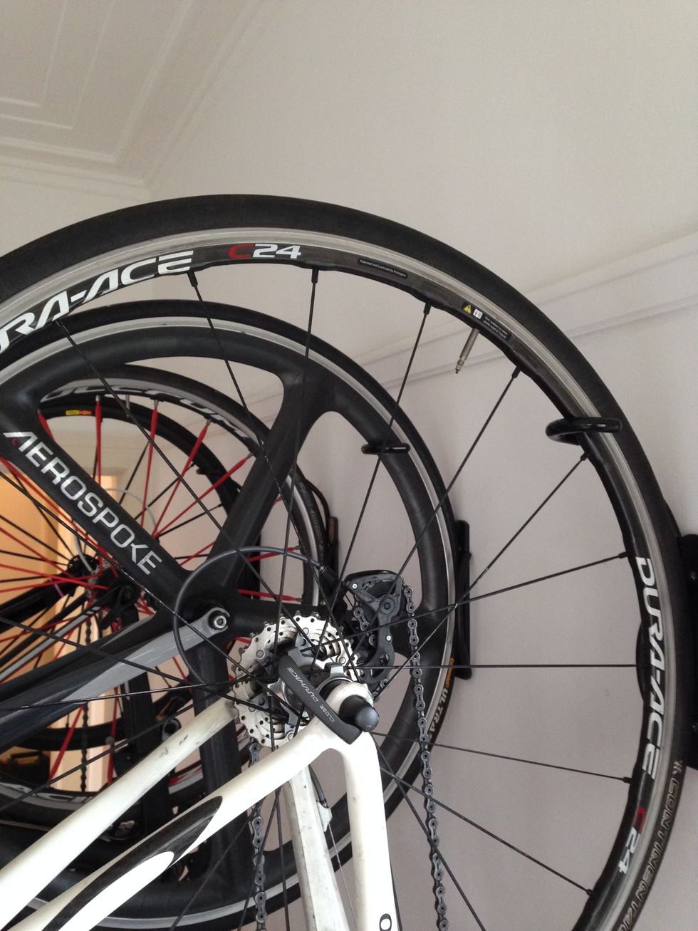 This wall mounted bike rack is so efficient with space that you can place more than one side by side. you can even position the bike top to tail so they can be even closer