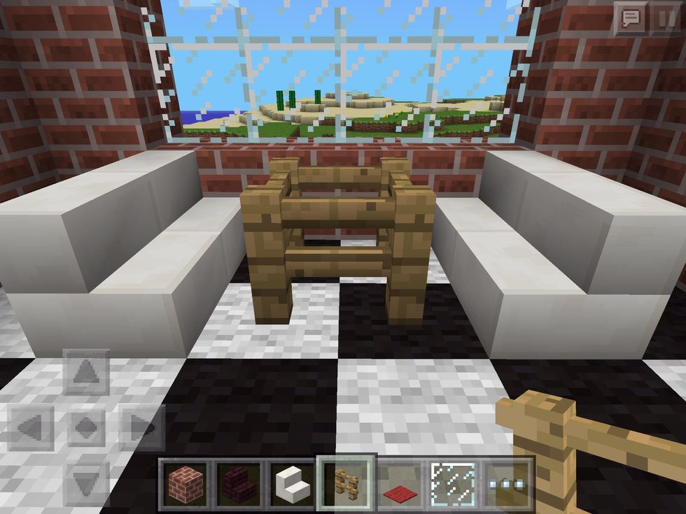 This will be a kitchen/dining room. Stair blocks for seats, and fences make perfect table legs!