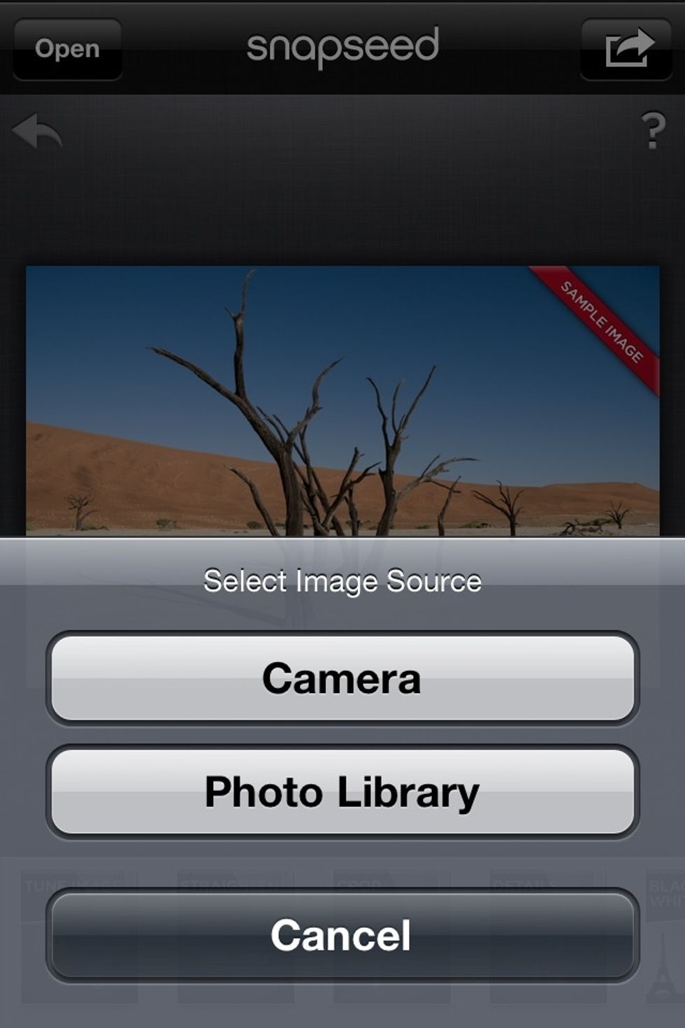 This will come up. Choose PHOTO LIBRARY, then select your photo from your CAMERA ROLL. You can also take a photo in the app by tapping CAMERA.