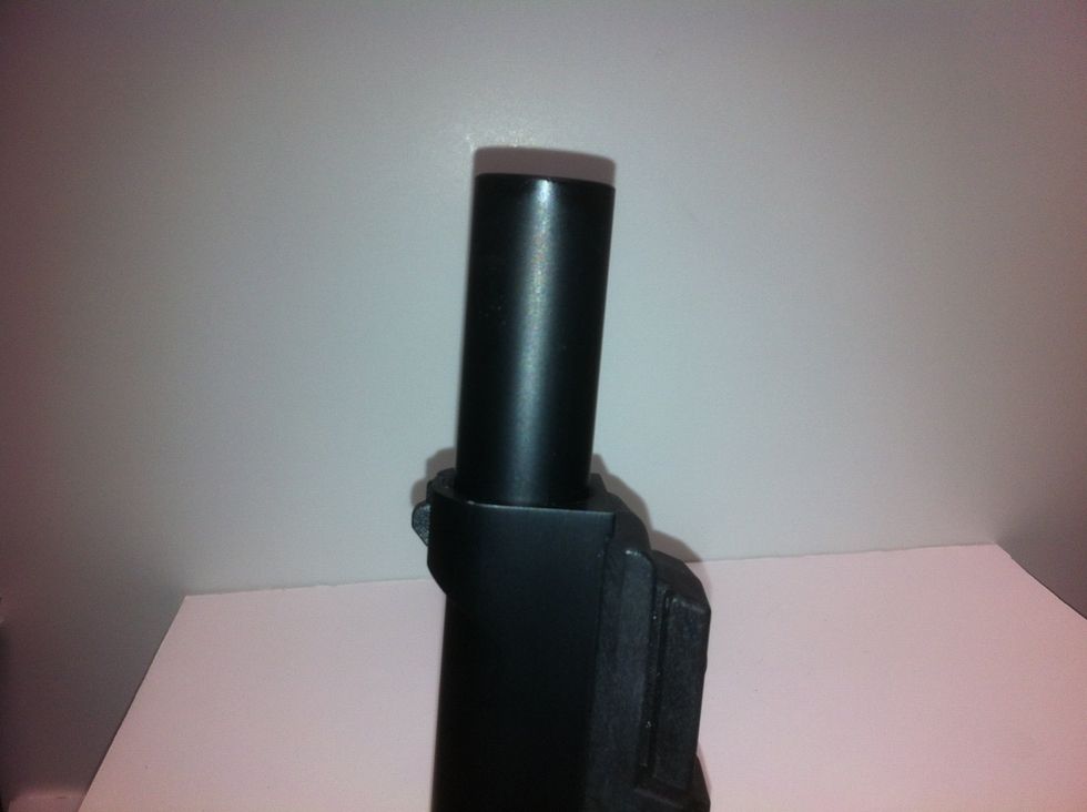This will release the barrel and the spring inside the marker will push it outward.