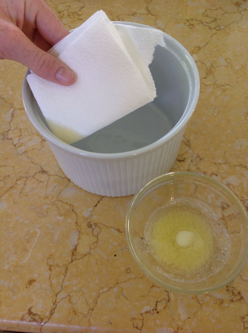 Thoroughly coat your souffl\u00e9 dish with melted butter.