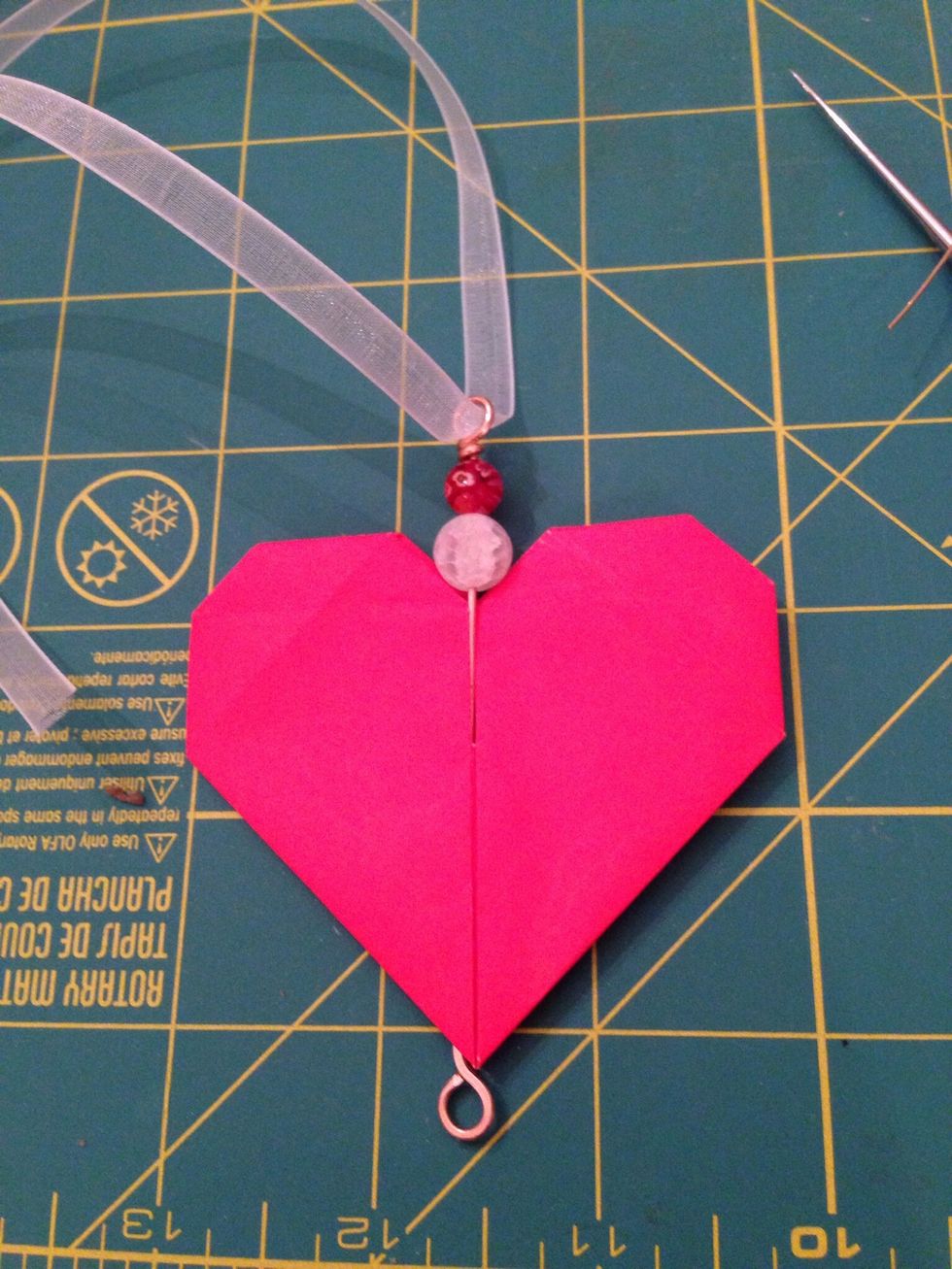 Thread ribbon through the loop.