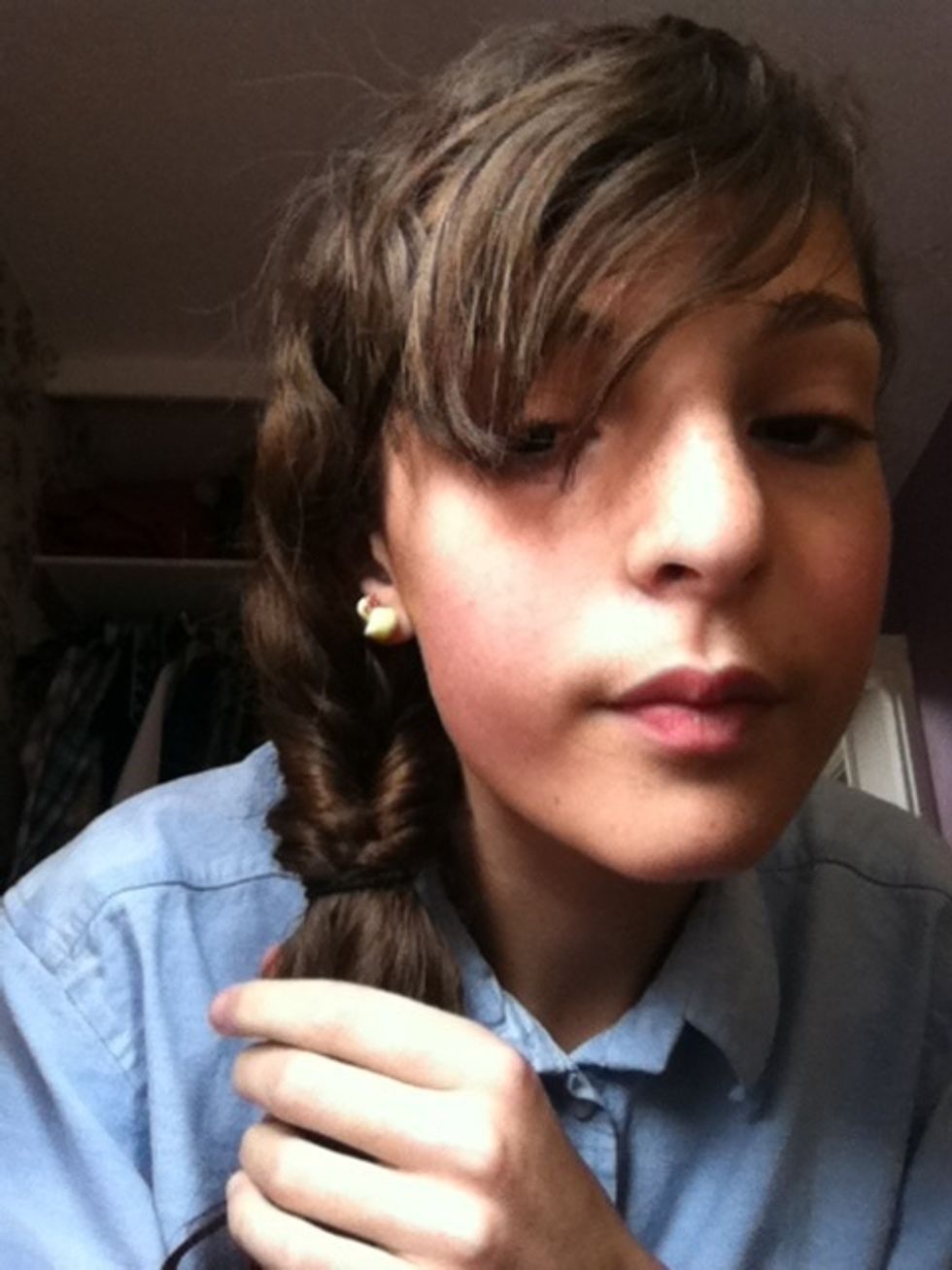 Thread the rest of your hair through the hole from the front to the back and pull it a bit tight but not too tight