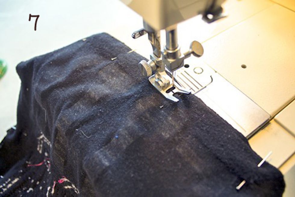 Thread your sewing machine with the same color thread as the t-shirt you are using. Starting at one corner, sew along the inside edge with a straight stitch, leaving about a 1/4" border.