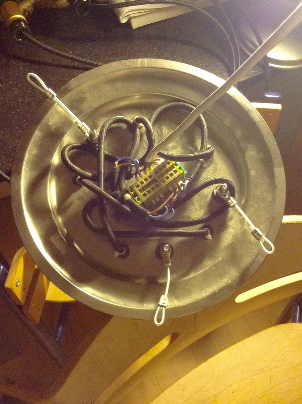 Three pieces of wire should be enough for holding the base in balance.