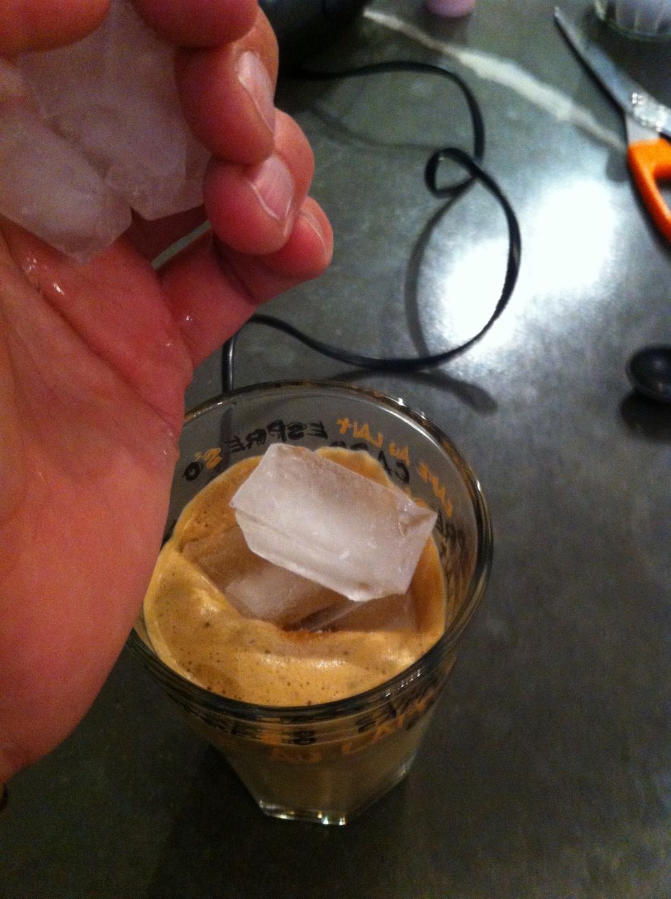 Three to four ice cubes depending on how big glass you are using