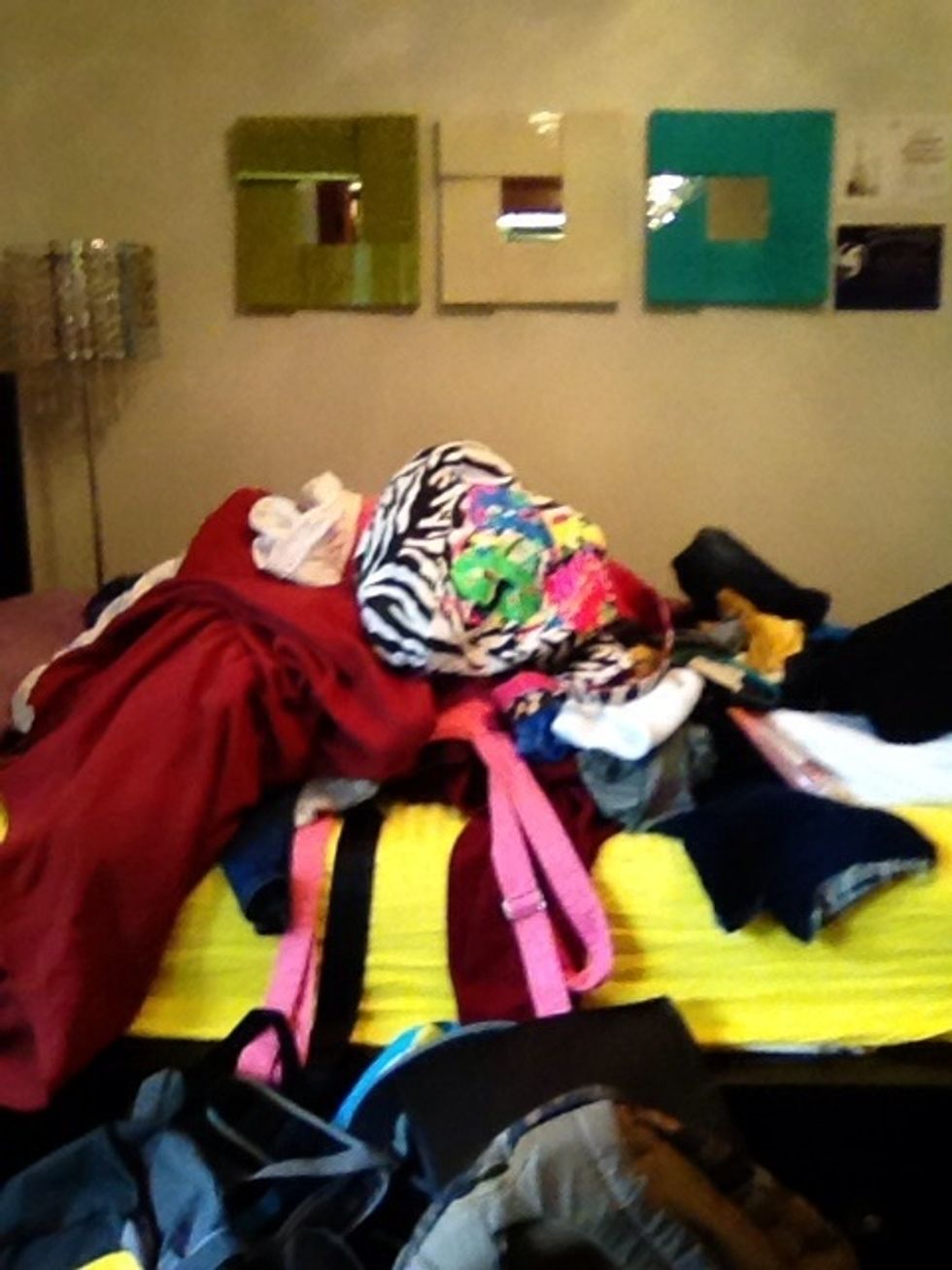 Through all the stuff not hanging on your bed.