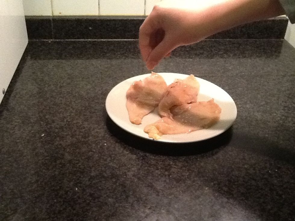 Throw a bit of salt on the fillet chicken.