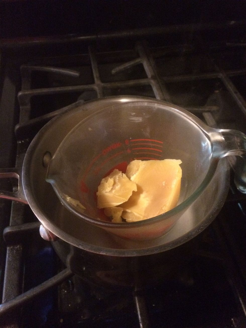 Throw beeswax in double boiler. I use a measuring cup in a pot.