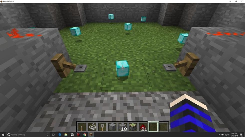 Throw diamonds or something somewhat valuable that somebody would want all around the inside. Make sure that one of the items is on top of the middle part of the string.