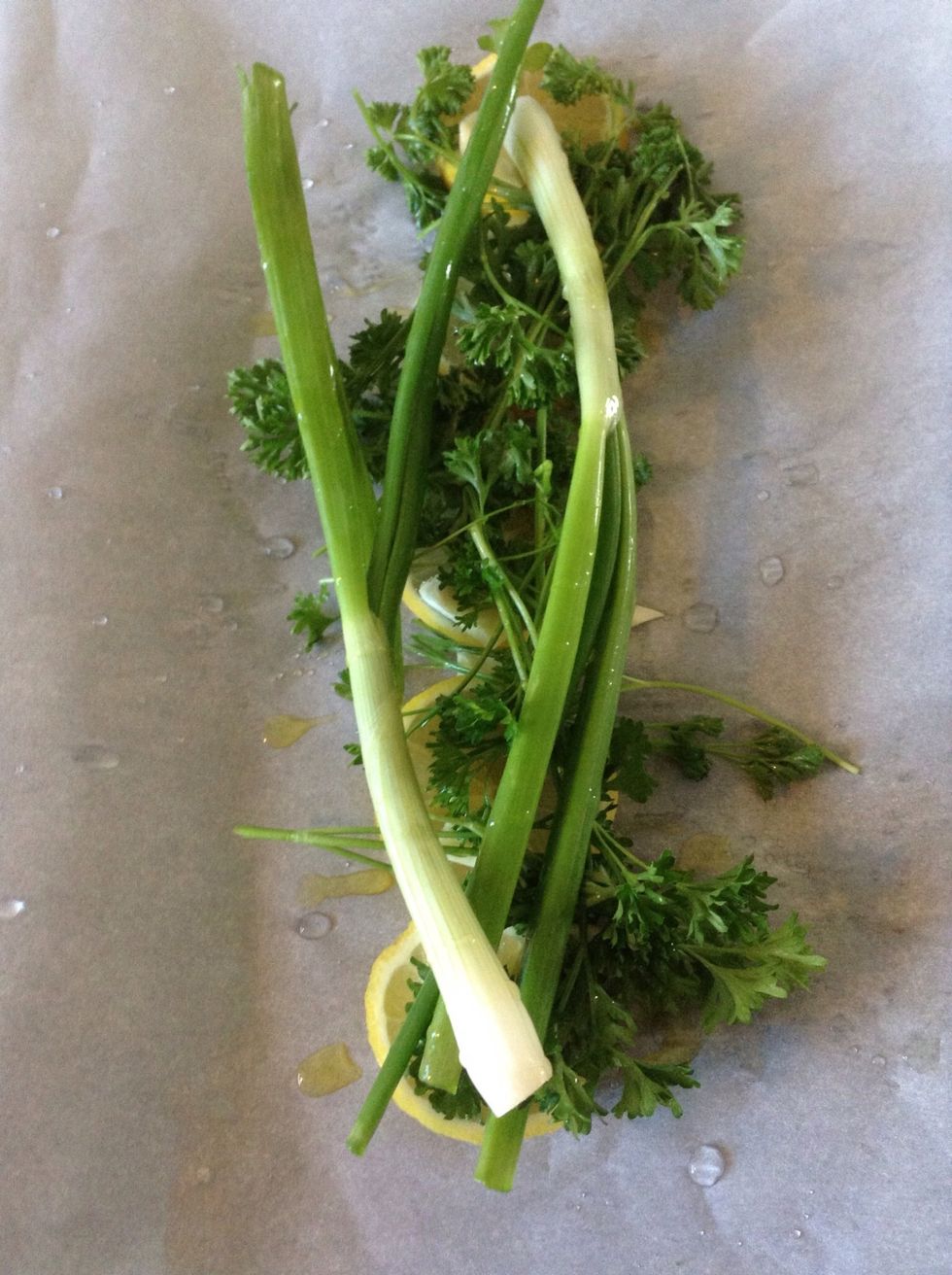 Throw down a couple green onions and then sprinkle on some olive oil.