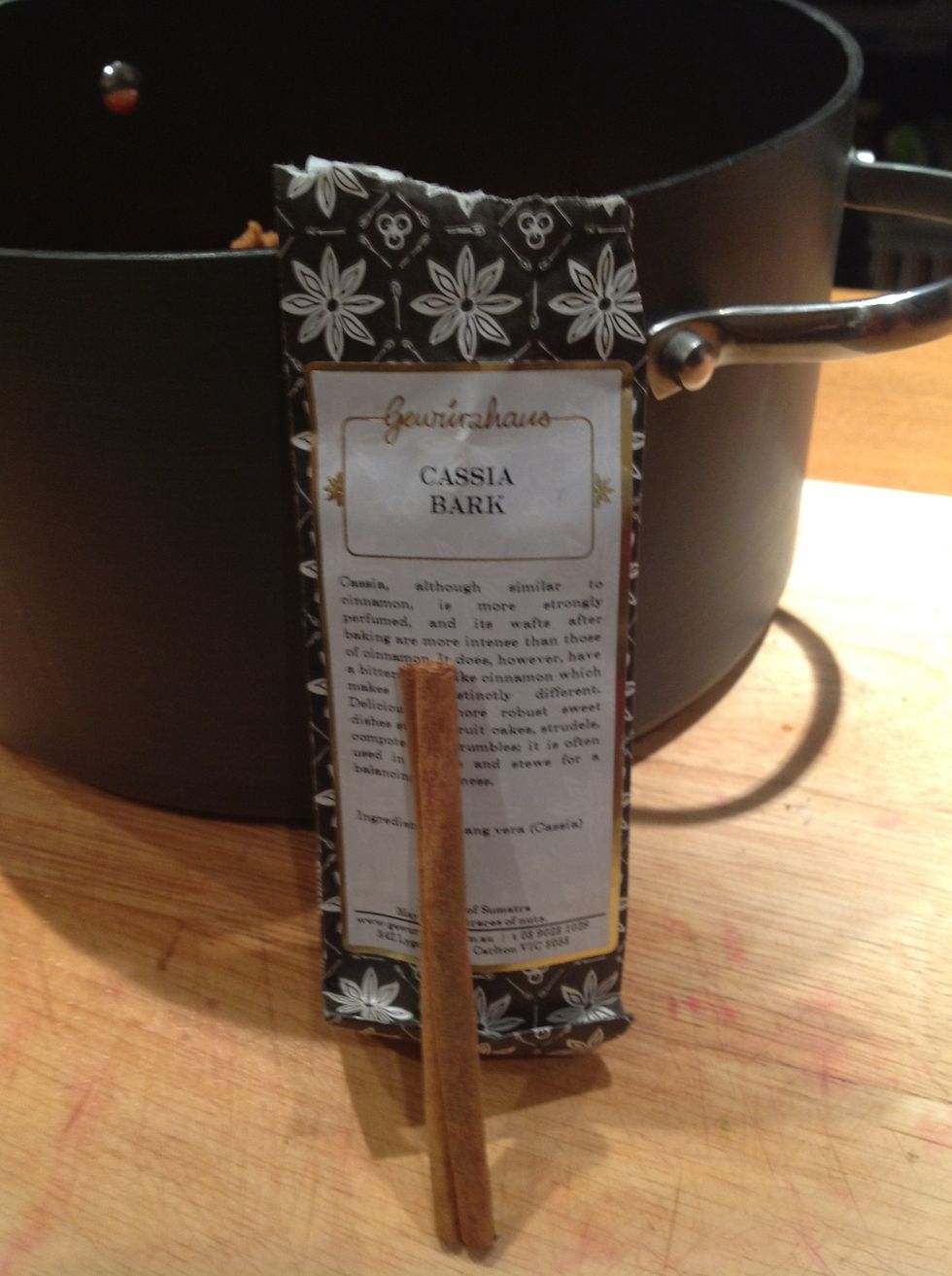 Throw in a piece of Cassia bark for flavour. Just make sure you don't try to eat the piece of bark after it is cooked :-)