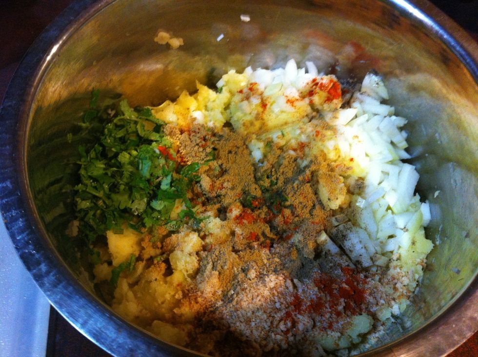 Throw in all the powdered spices.