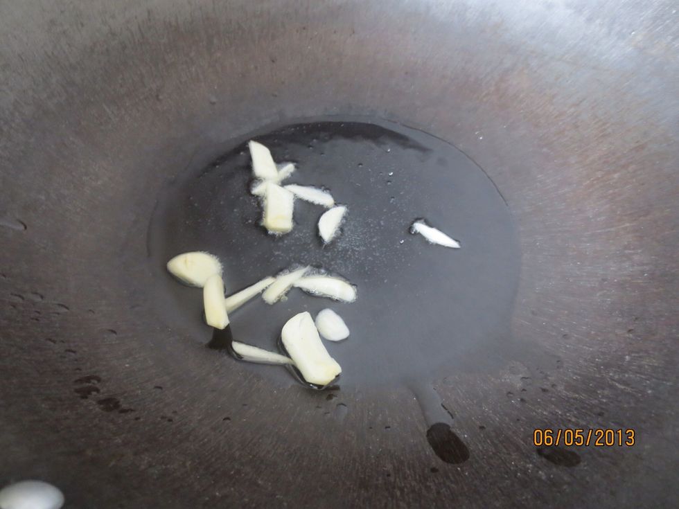 Throw in garlic and stirfry for a couple seconds