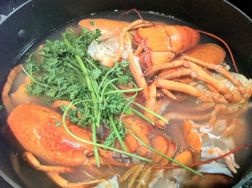 Throw in parsley, onions, bay leaves, 3 tbsp kosher salt, and the tiniest pinch of finger crushed saffron (the way Rufio likes it. Not necessary). Pour water until full covered and bring to a boil