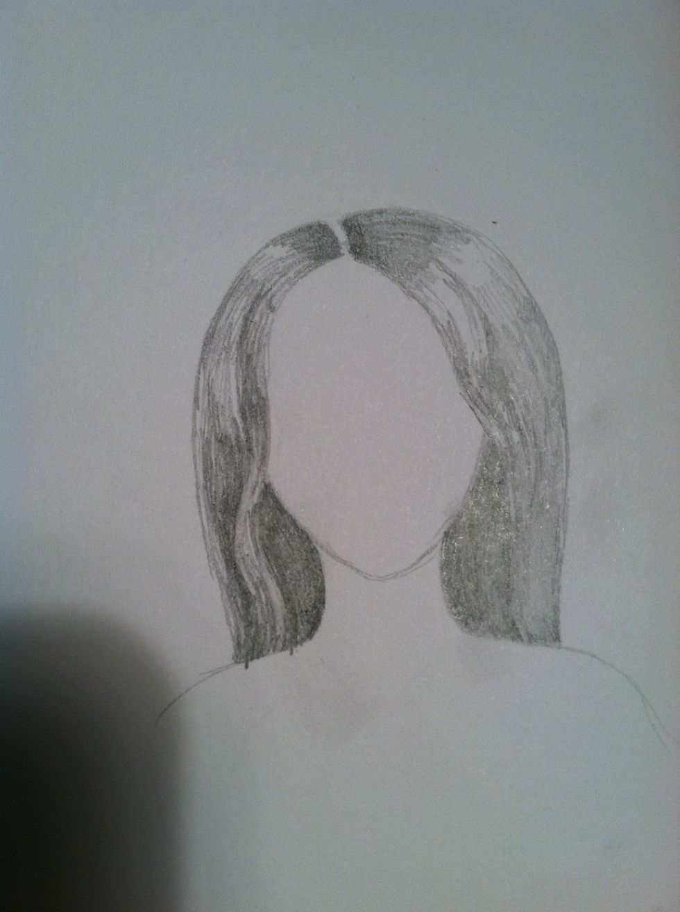 Throw in some basic shading. Note that the hair partially hidden by the neck, head, or other hair will be darker. The rest of the shading follows the basic contour of the head.