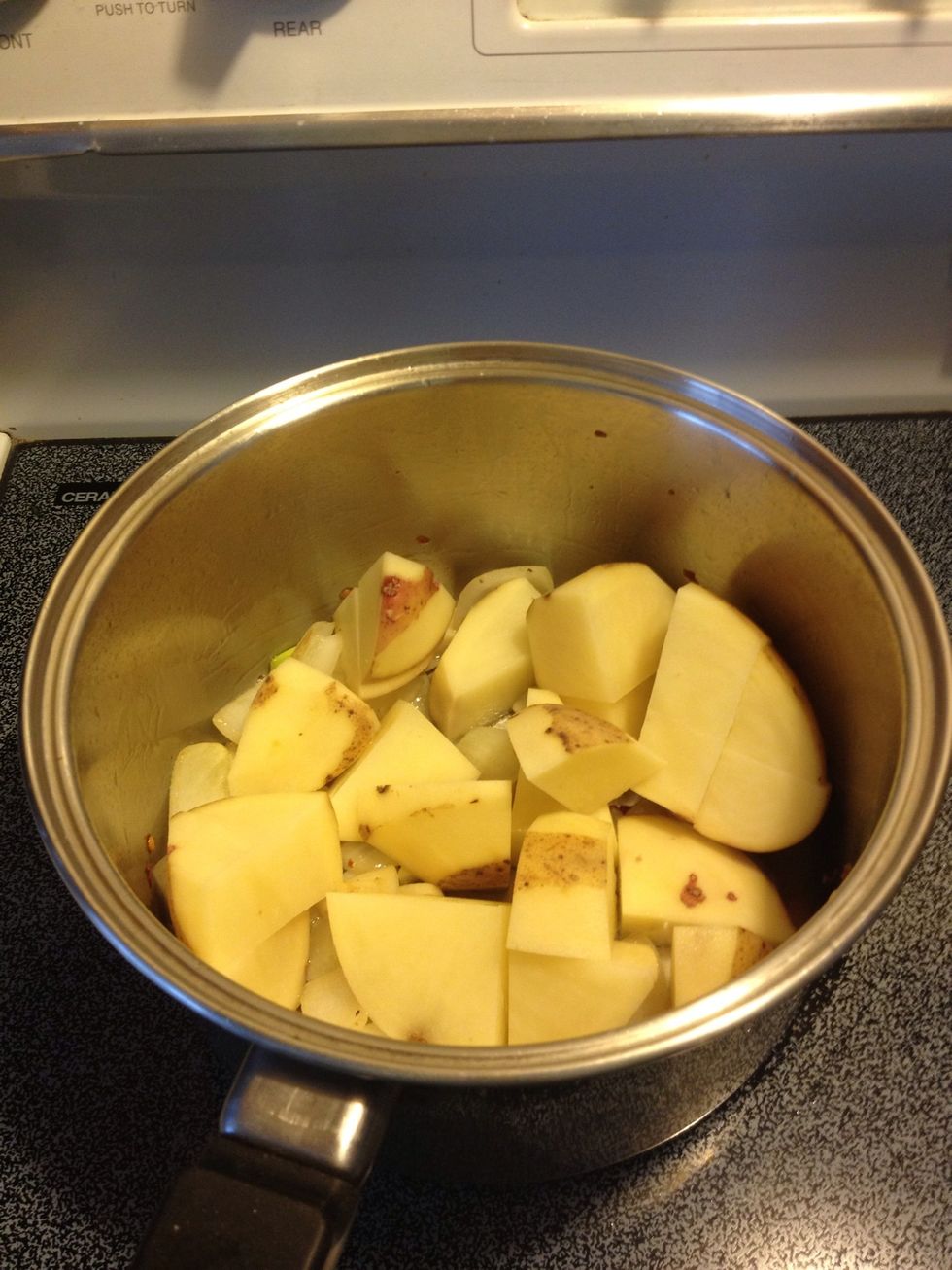 Throw in the potatoes. Cut them smaller if you want them cooked quicker.
