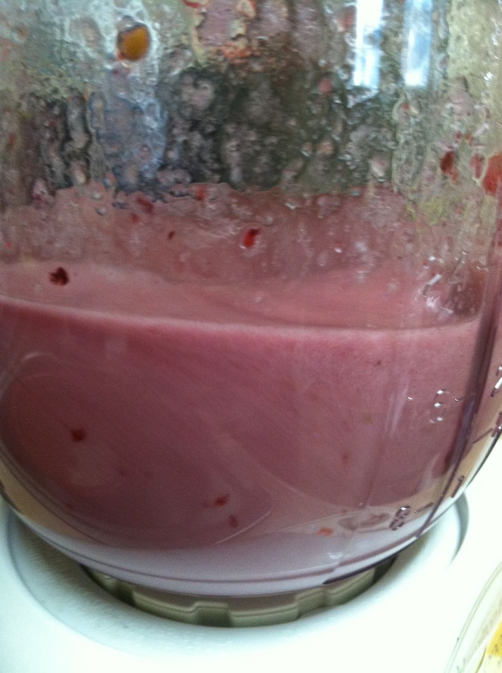 Throw in the strawberries after you've started blending (stop blender 1st)