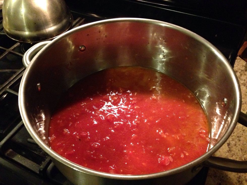 Throw in the tomatoes, salt and pepper to taste.