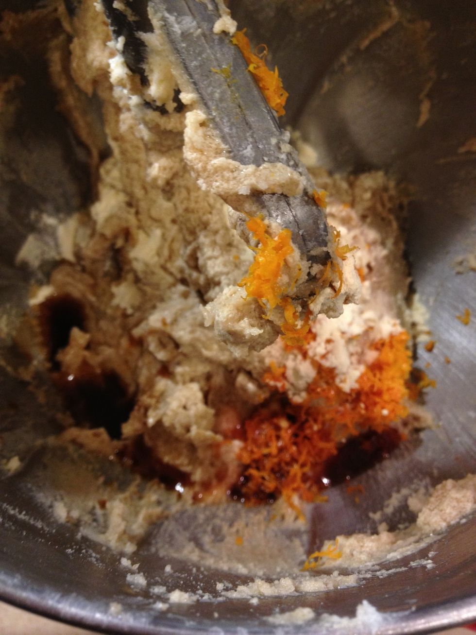 Throw in the vanilla and orange extract and mix until distributed.