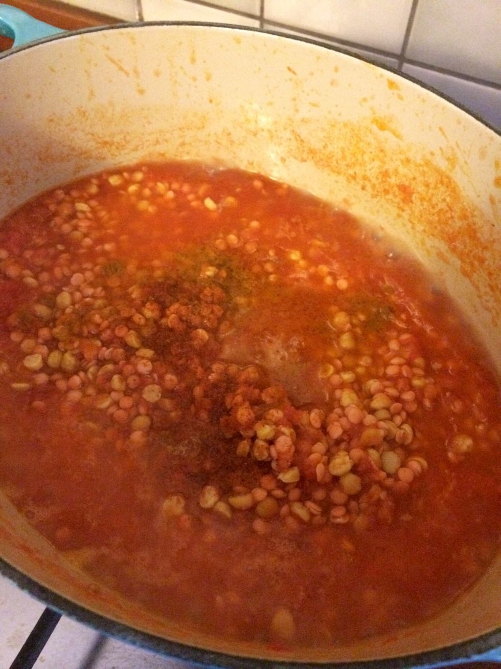 Throw in your lentils and allow to boil under medium heat for 10mins. Add the turmeric and chili powder into the pot and stir well.
