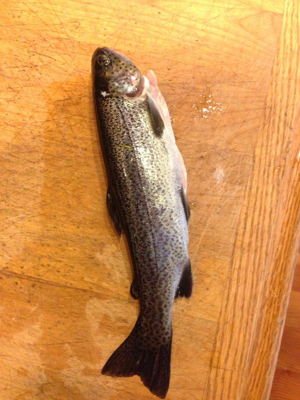 Throw it on the cutting board, and cut off the heads. Try not to get too grossed out. ;) \ud83d\udc1f