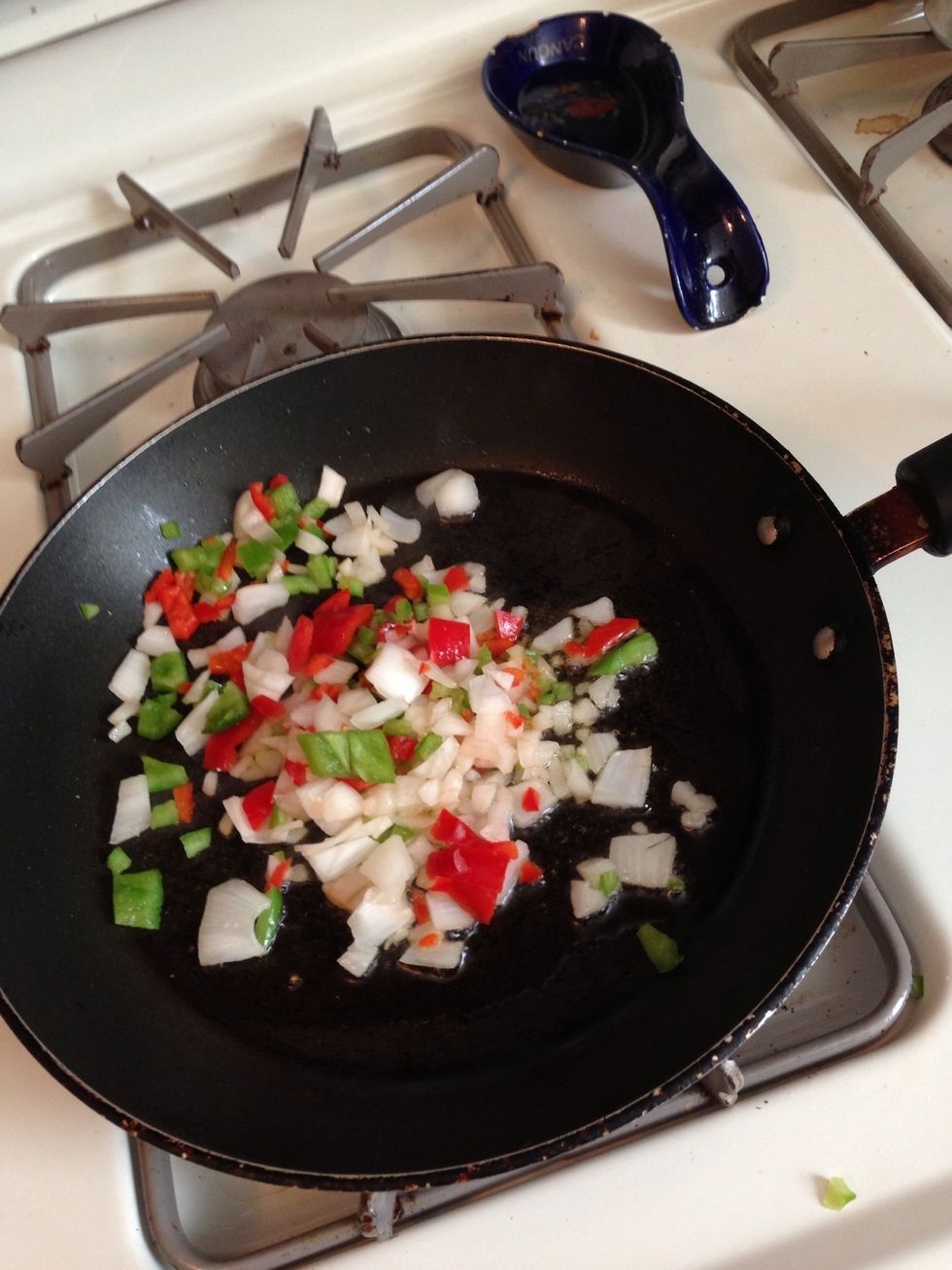 Throw peppers & onion in pan and let sizzle for 3-4 minutes or until soft. Stirring occasionally!
