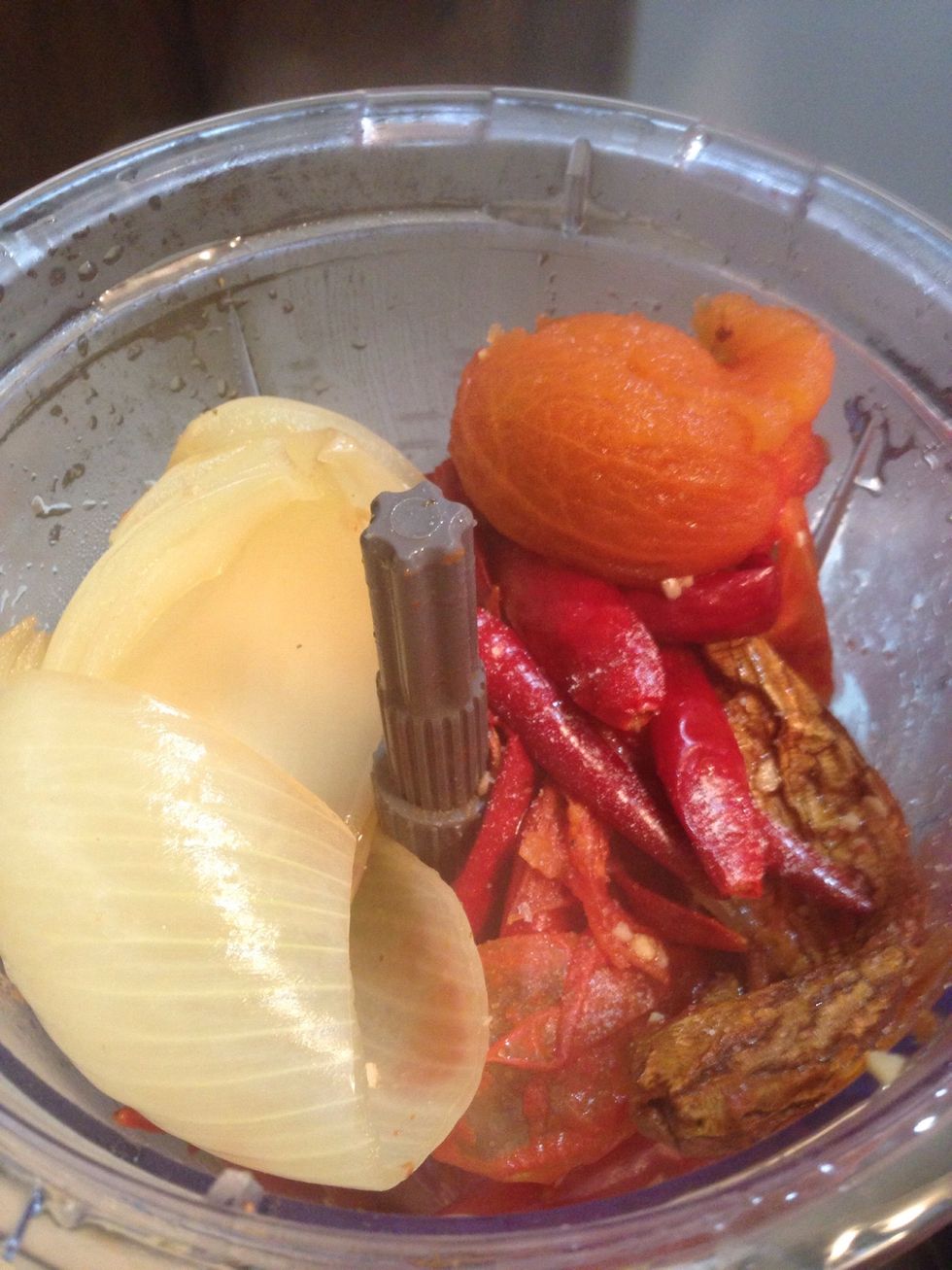 Throw some of the water away. Then blend everything with 2 cup of the beef broth.