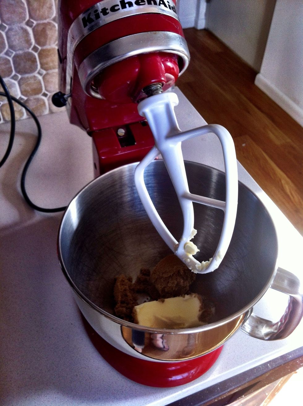 Throw the brown sugar and butter in your mixer, and let them get all cozy and friendly until they are smooth.