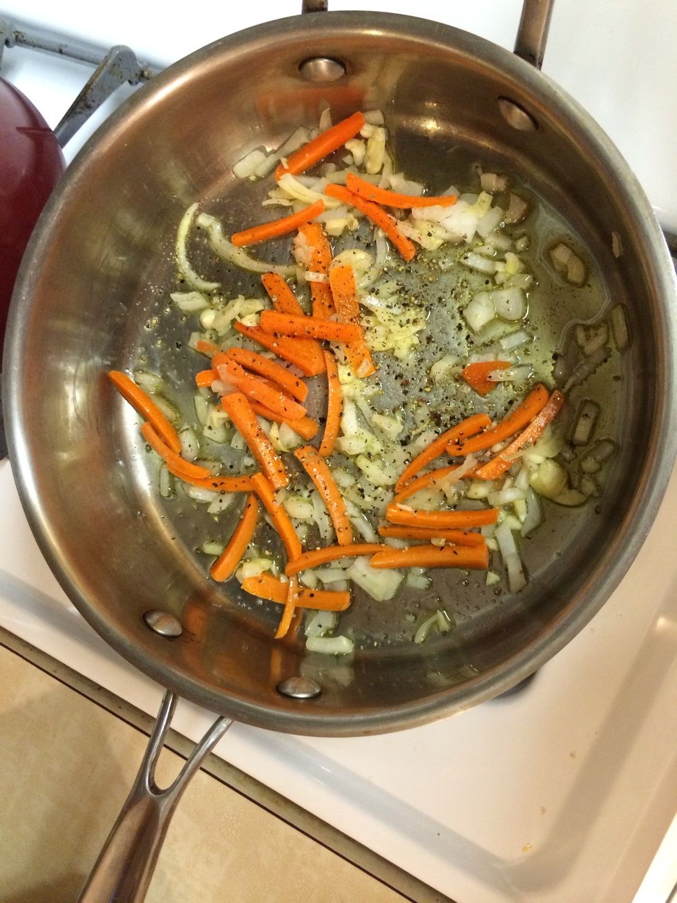 Throw the carrots , garlic, and onions in first with olive oil add a pinch of salt and pepper \ud83d\ude0a