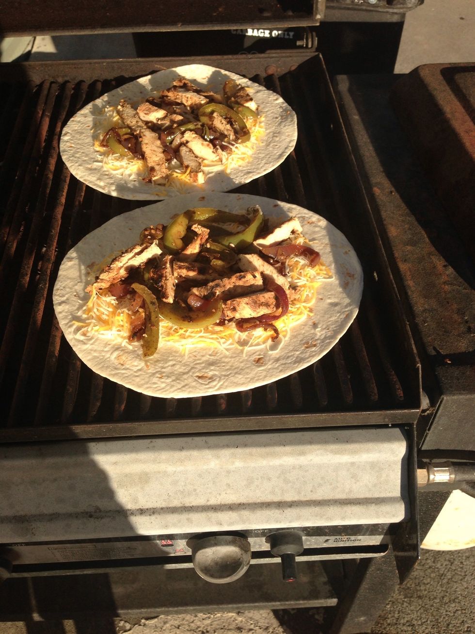 Throw the tortilla on the grill on medium heat. Leave the tortillas on for around 3-4 minutes or until golden brown.