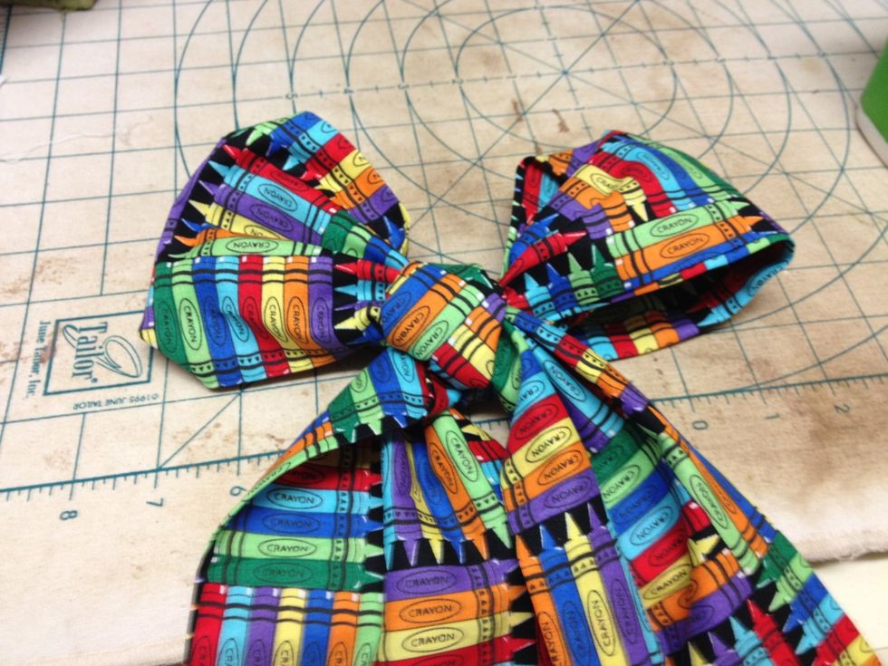 Tie a bow.