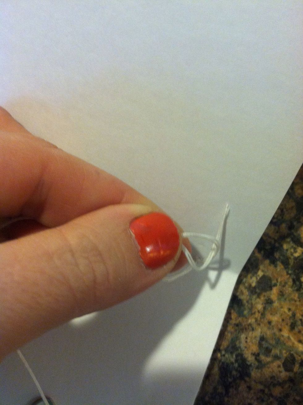Tie a knot and cut the extra thread off (this is the only knot tied until the very end)