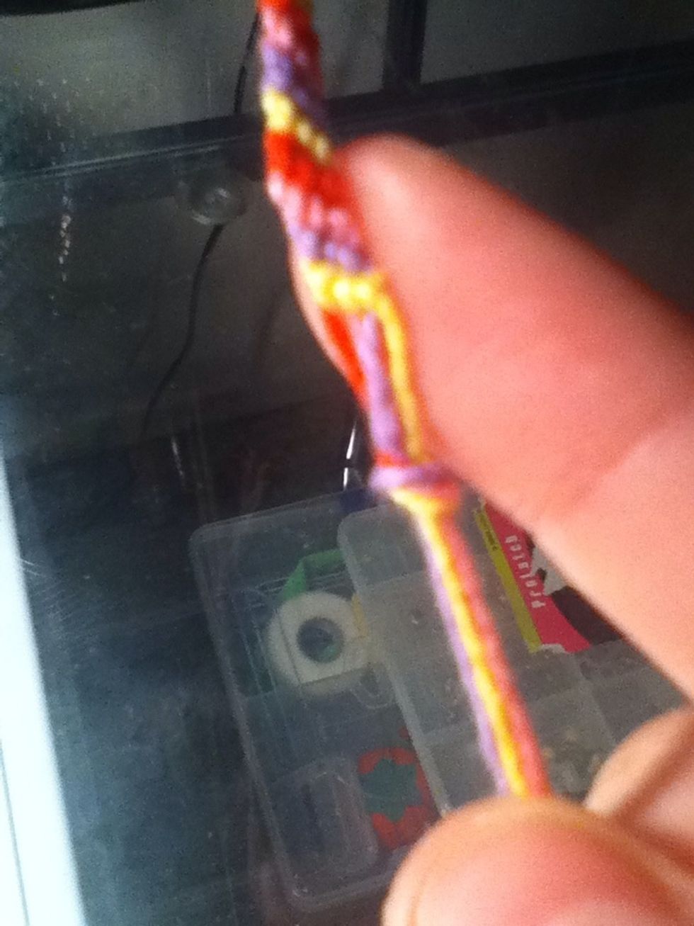 Tie a knot, and then tie it around your wrist!