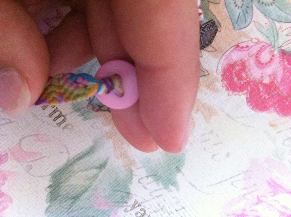 Tie a knot at the end of your bracelet.
