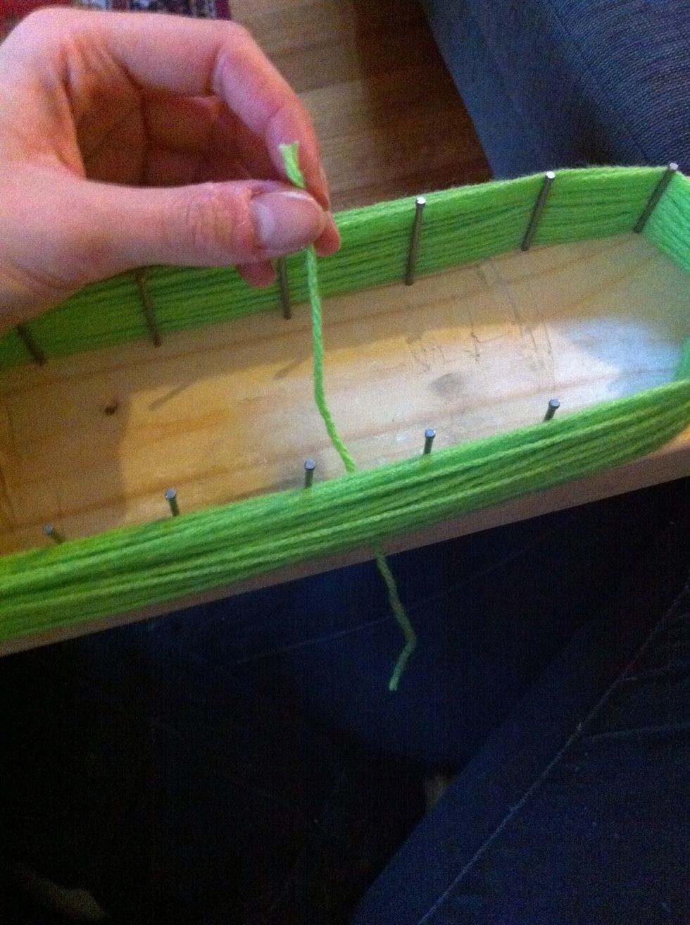 Tie a knot in-between nails, I tied a tight single knot that was looped twice.