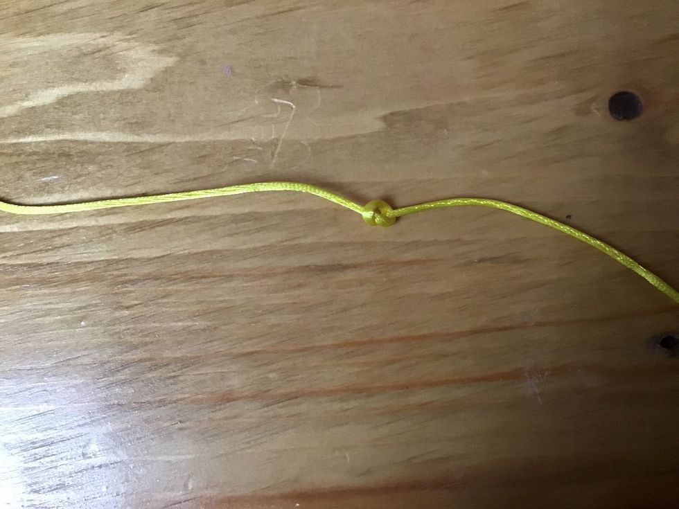 tie a knot onto your string so your beads don\u2019t fall off