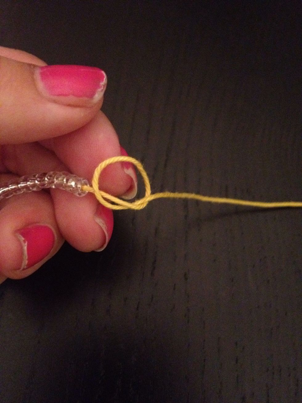 Tie a knot where The breads end. So They don't move around.