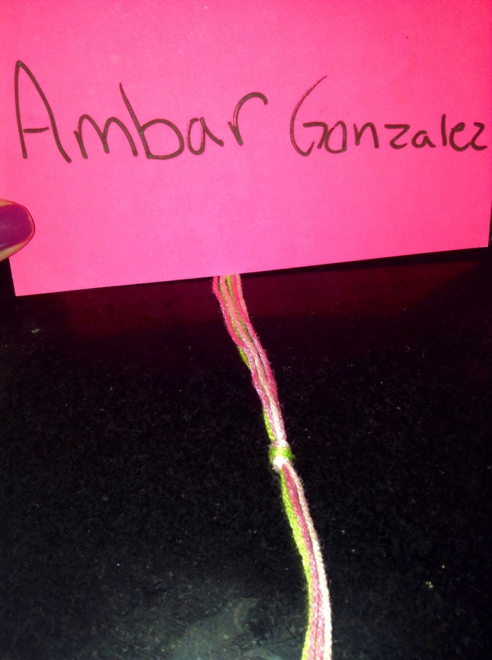 Tie a knot with all of them a the top leaving about 1 \u00bd inches on the top part.