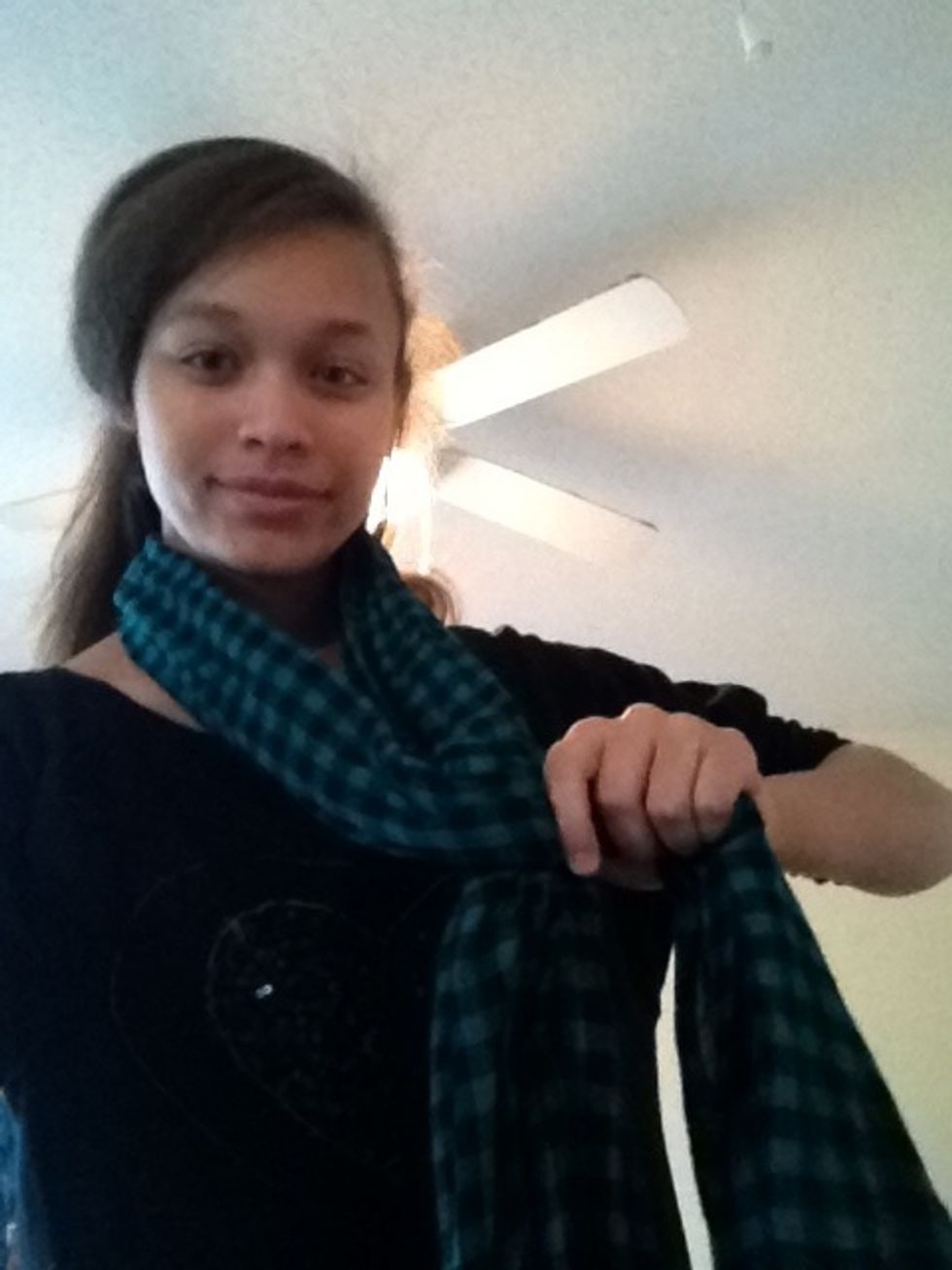 Tie a loose knot about halfway down.