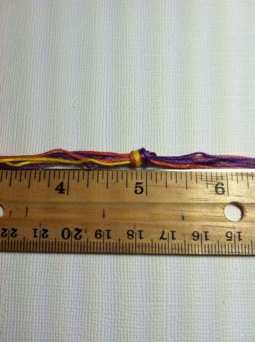 Tie a loose overhand knot at 5 inches. See my guide on knots for more information.