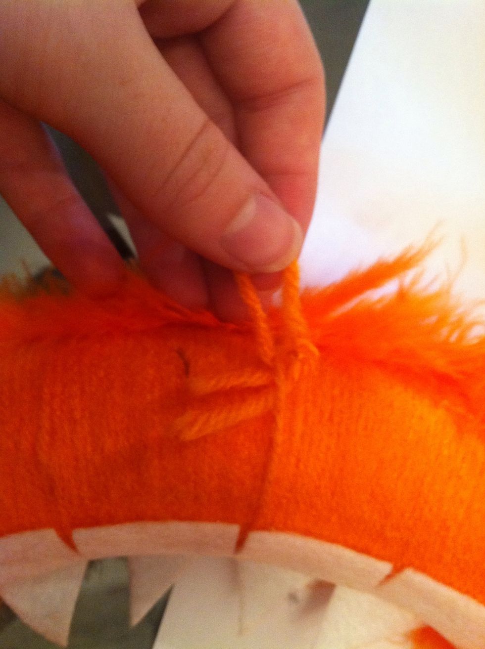 Tie a small loop on the back of the wreath.