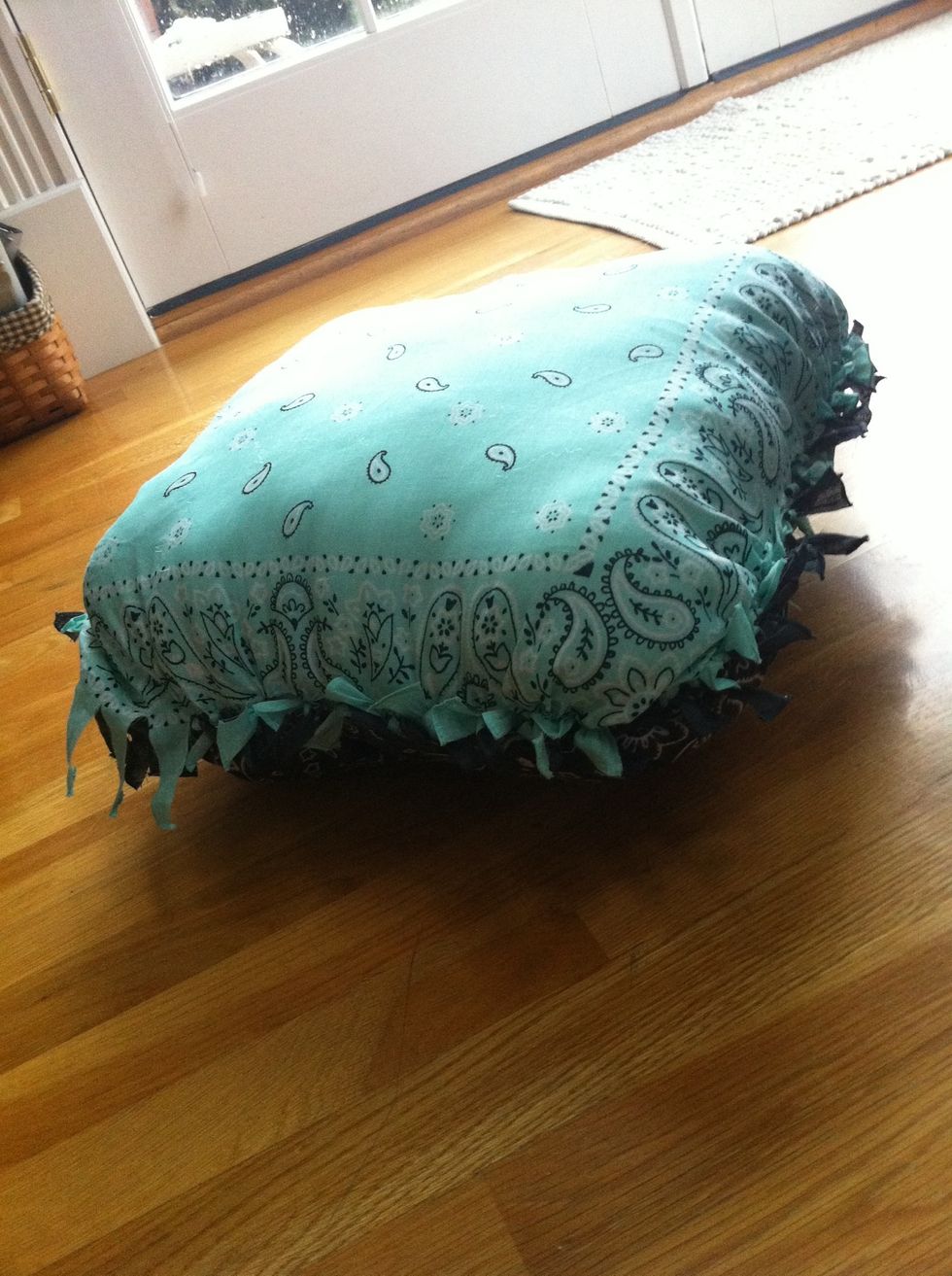Tie all of the strips together but leave about 7 or 8 of the cut strips untied