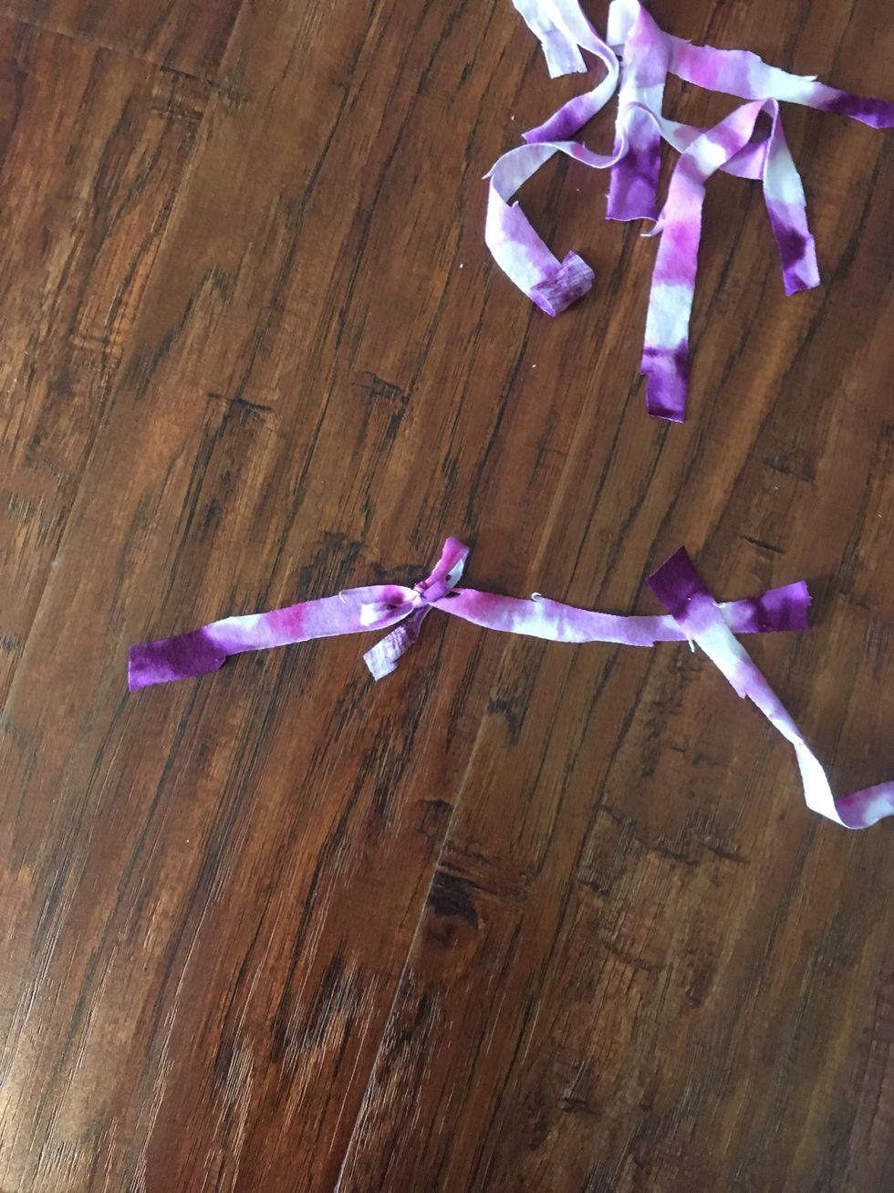 Tie all the strips together