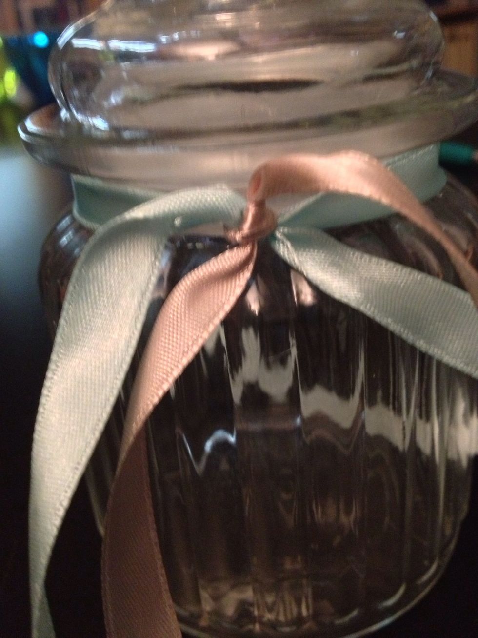 Tie another knot over the knots you've made earlier.