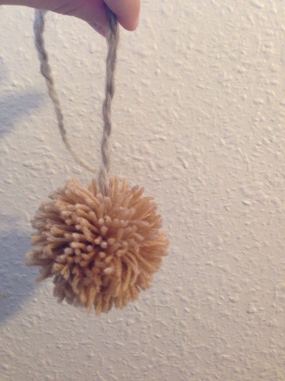 Tie another piece of wool around it